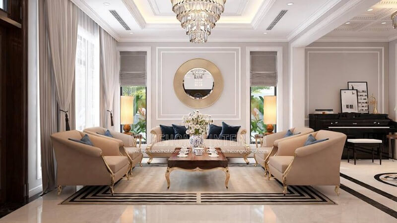 Bộ bàn ghế sofa tân cổ điển mạ vàng gam màu trắng sữa nhẹ nhàng nhưng lại tạo điểm nhấn đẹp, sang trọng cho phòng khách. Thiết kế nội thất bệt thự Hà Nội