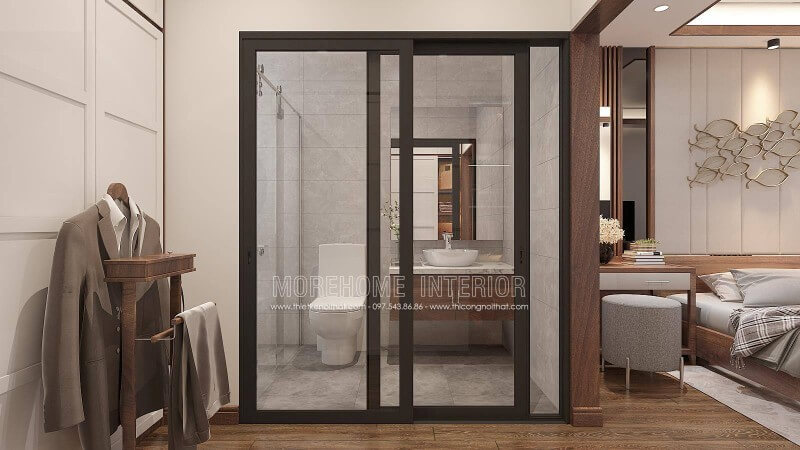 Với không gian diện tích không quá lớn việc sử dụng cửa kính trượt sẽ giúp căn phòng trở nên thông thoáng đặc biệt với lớp cửa kính cường lực càng tăng tính mở trong thiết kế phòng ngủ nam khép kín liền phòng tắm, phòng vệ sinh. thiết kế phòng ngủ