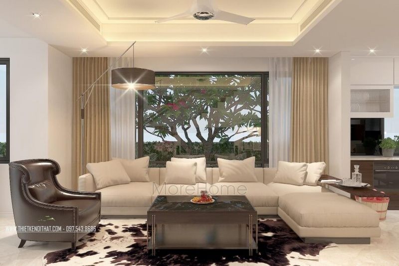 Bàn trà gỗ mặt kính hiện đại được thiết kế đơn giản nhưng đầy tiện nghi và sang trọng.