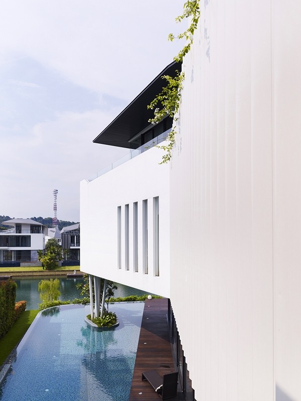 Thiết kế biệt thự hình boomerang sang trọng với hai sắc đen và trắng 2